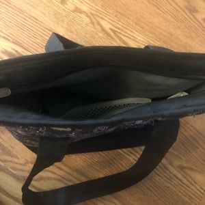 Small zipper tote with mesh inner pocket.